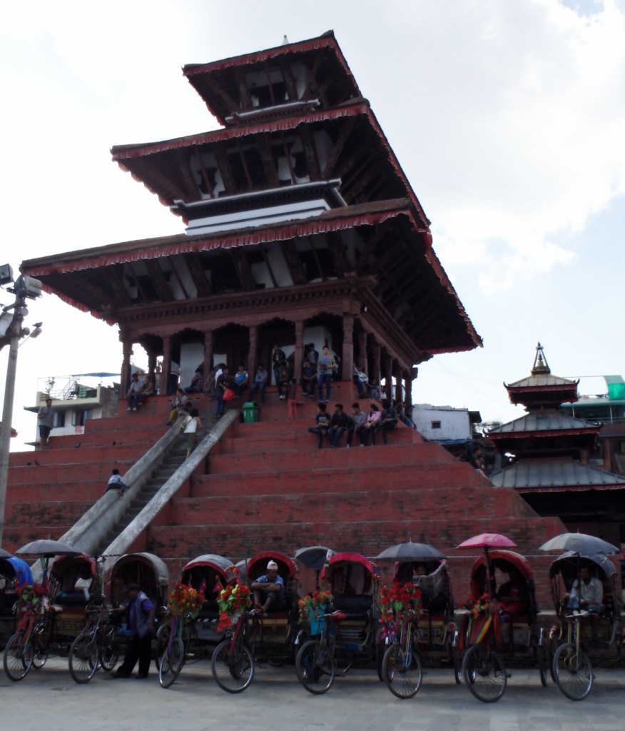 Nepalese up the stairs
